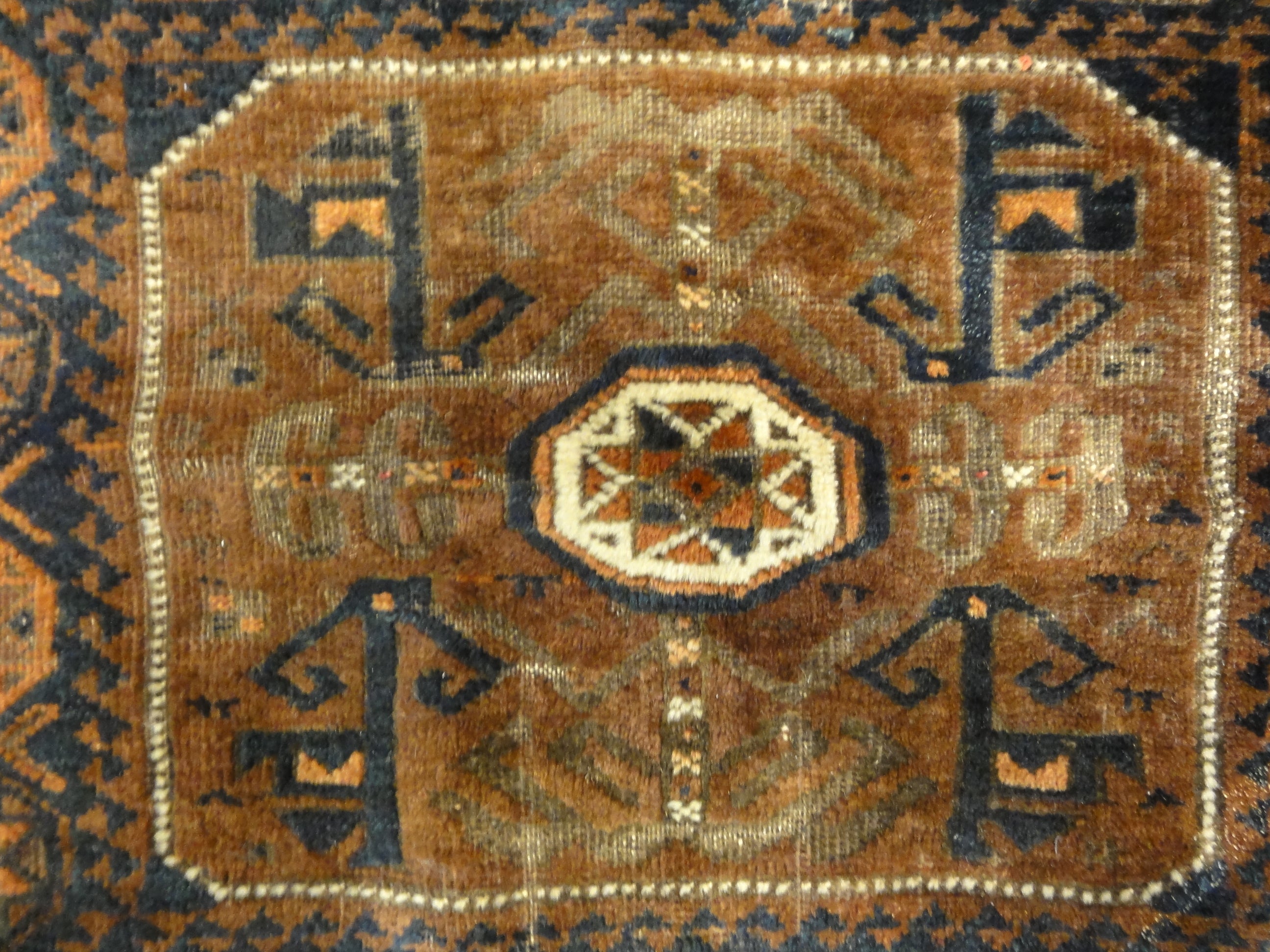 Antique Baluch Bagface. Rugs & More in the Santa Barbara Design Center. This Antique Baluch Bagface is a beauty, unique, and a treasure to be found.