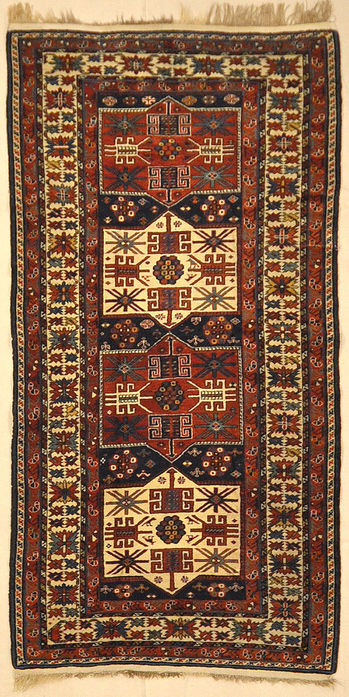 Amazing Caucasian Shirvan Baku Rug. An antique piece of woven carpet art sold by the Santa Barbara Design Center Rugs and More in Santa Barbara, California.
