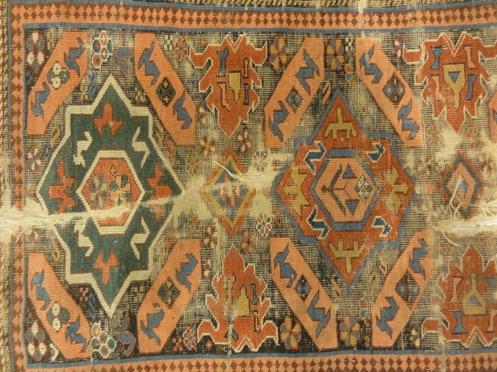 Antique Kuba East Caucasian Rug. A piece of genuine authentic woven carpet art sold by Santa Barbara Design Center, Rugs and More.