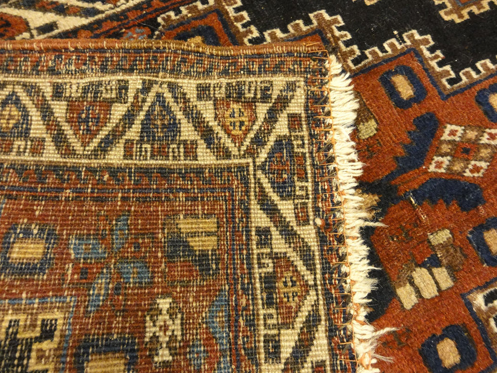 Fine Southwest Persian Afshar Bagface. A piece of woven carpet art sold by the Santa Barbara Design Center Rugs and More in Santa Barbara, California.