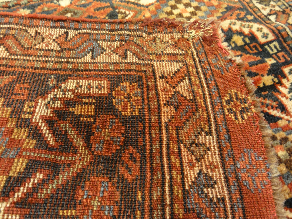 Antique Khamseh Southwest Persian Bagface. A piece of antique woven carpet art sold by Santa Barbara Design Center Rugs and More in Santa Barbara, CA.