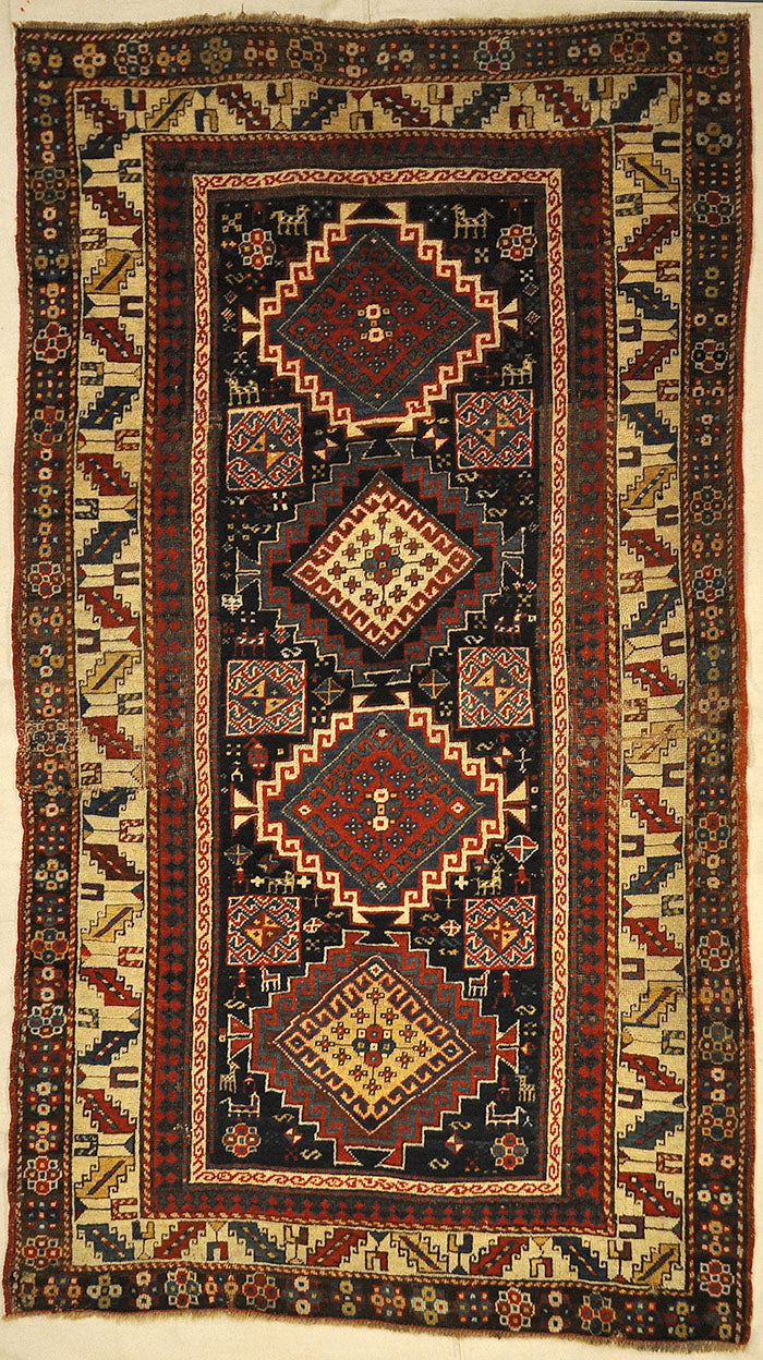 Caucasian Marriage Rug From 1880s. A piece of genuine antique woven carpet art sold by the Santa Barbara Design Center, Rugs and More.