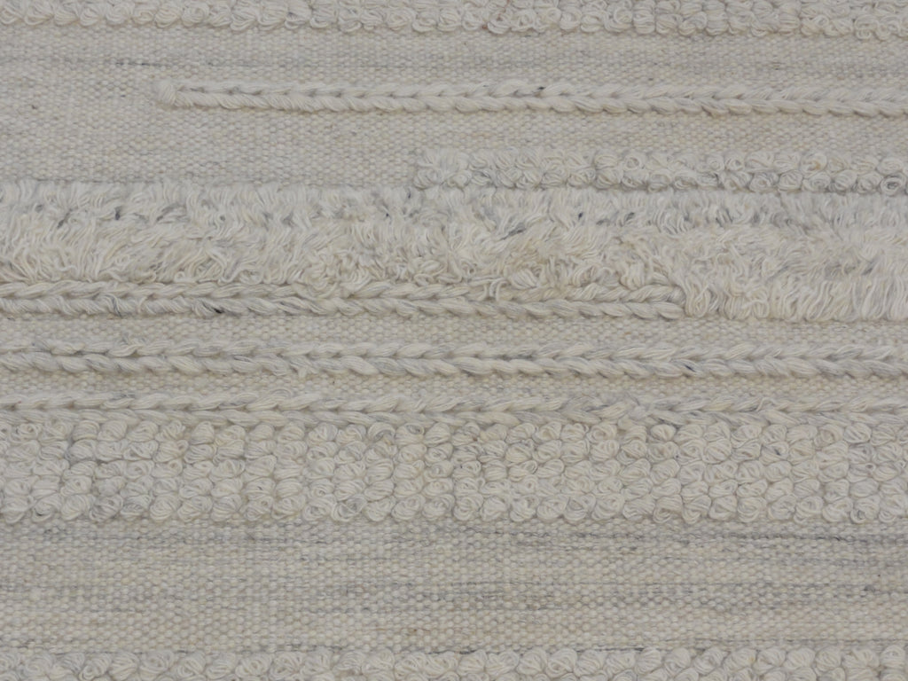 Close-up view of Ziegler &#038; Co Montecito Vibe rug showcasing a textured, woven pattern in neutral tones.