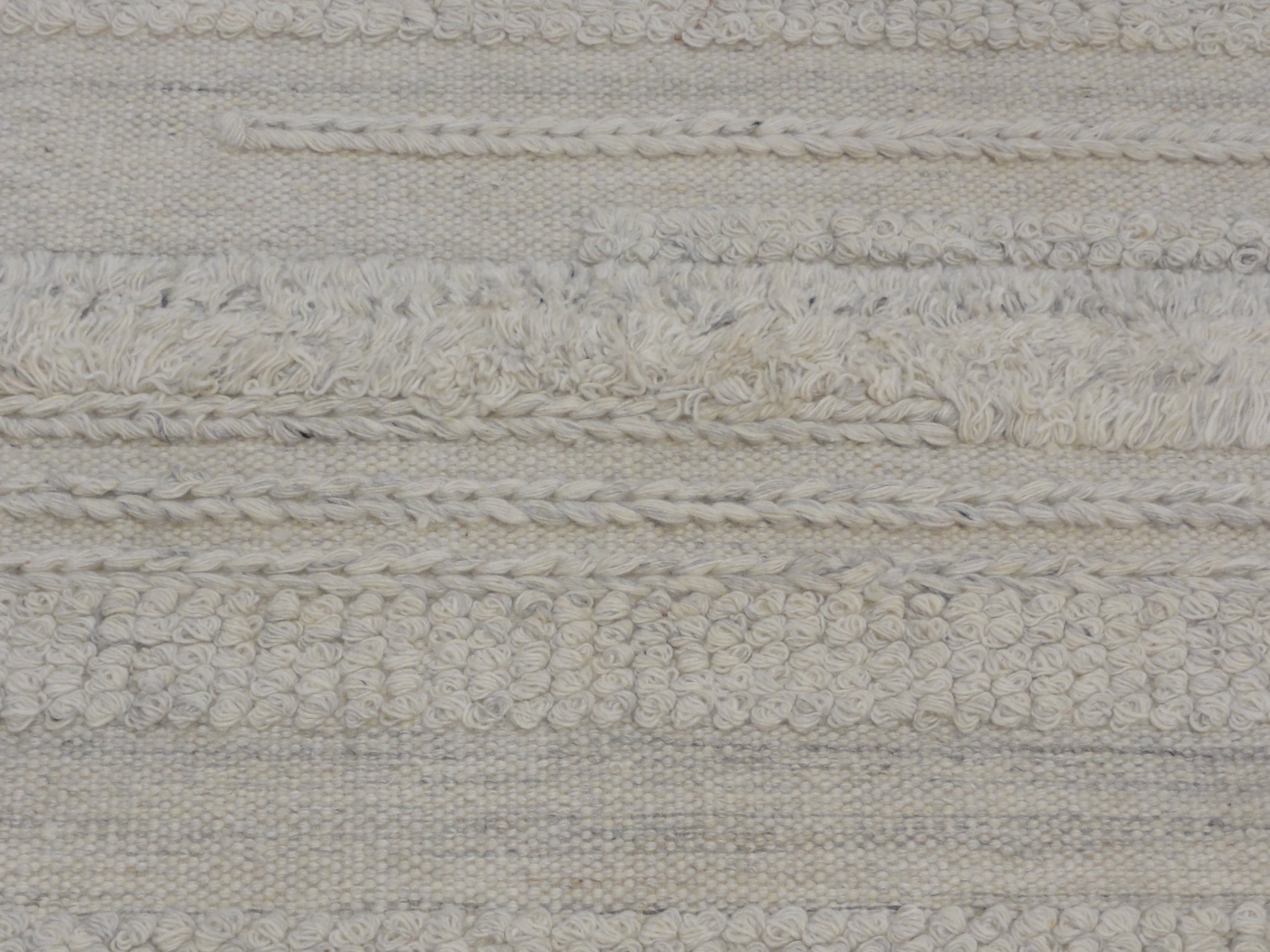Close-up view of Ziegler &#038; Co Montecito Vibe rug showcasing a textured, woven pattern in neutral tones.