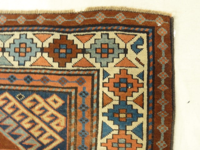 33852 Antique Kazak Rug
