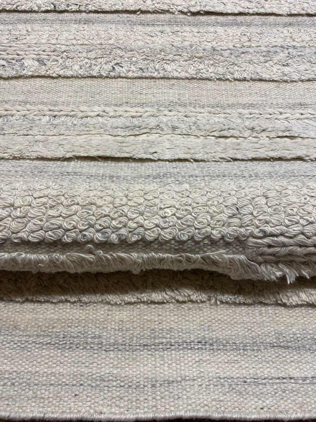 Close-up view of the texture and patterns on the Ziegler & Co Montecito Vibe Runner carpet, showcasing its intricate design and quality.