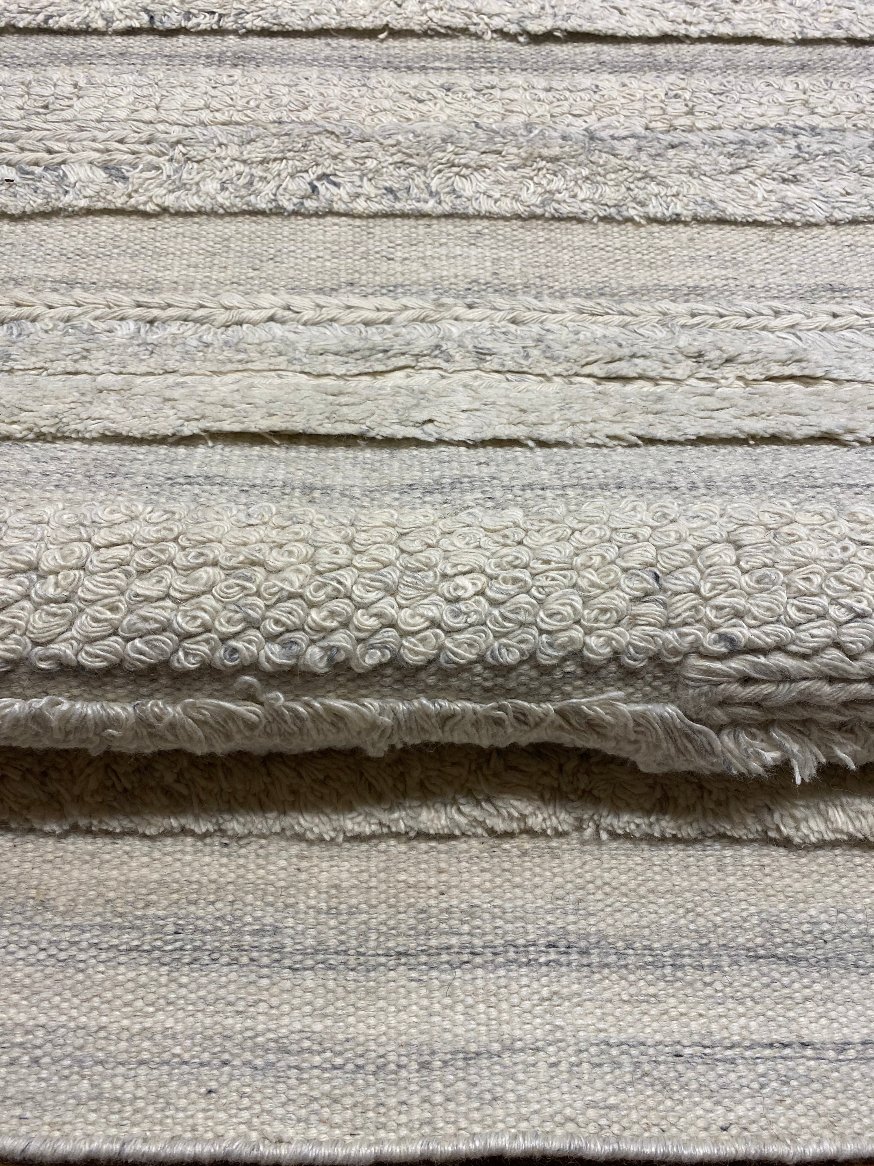 Close-up view of the texture and patterns on the Ziegler & Co Montecito Vibe Runner carpet, showcasing its intricate design and quality.