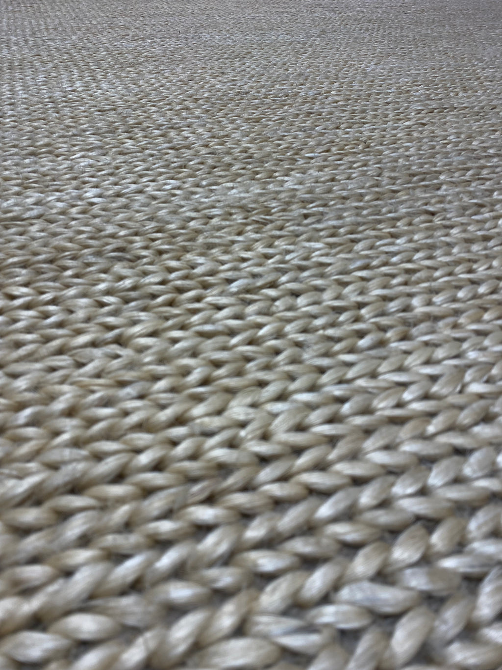 Close-up of the intricate woven pattern of a Ziegler & Co. Modern Rug, highlighting its texture and craftsmanship.