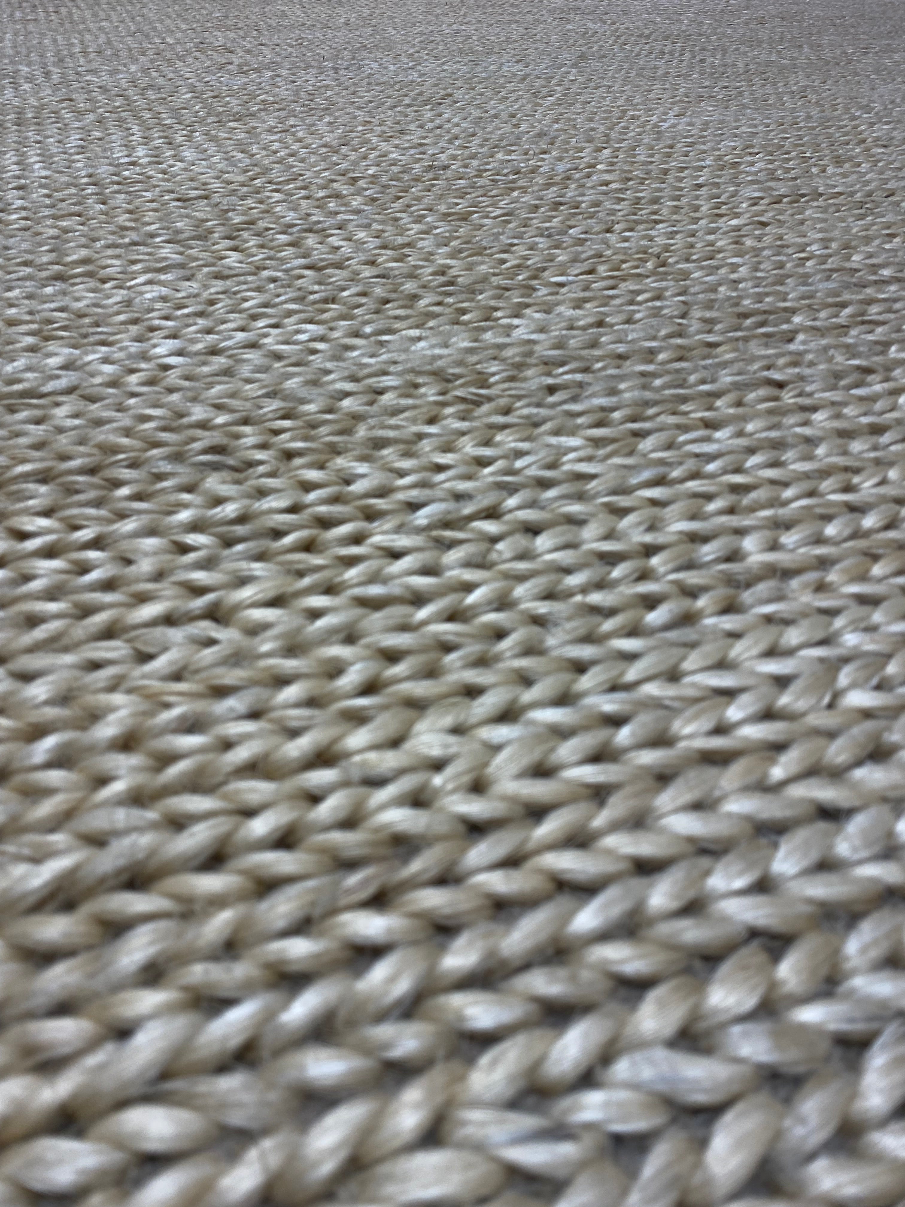 Close-up of the intricate woven pattern of a Ziegler & Co. Modern Rug, highlighting its texture and craftsmanship.