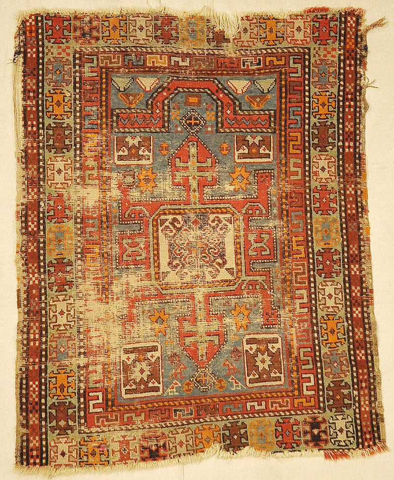 Antique Shirvan Rug. A piece of antique woven carpet art sold by the Santa Barbara Design Center Rugs and More in Santa Barbara, California.