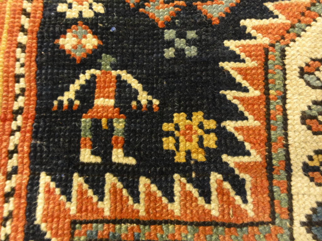 Antique Shirvan Rug Featuring Peacock and Two Men. A genuine authentic antique piece of woven carpet art sold by Santa Barbara Design Center, Rugs and More.