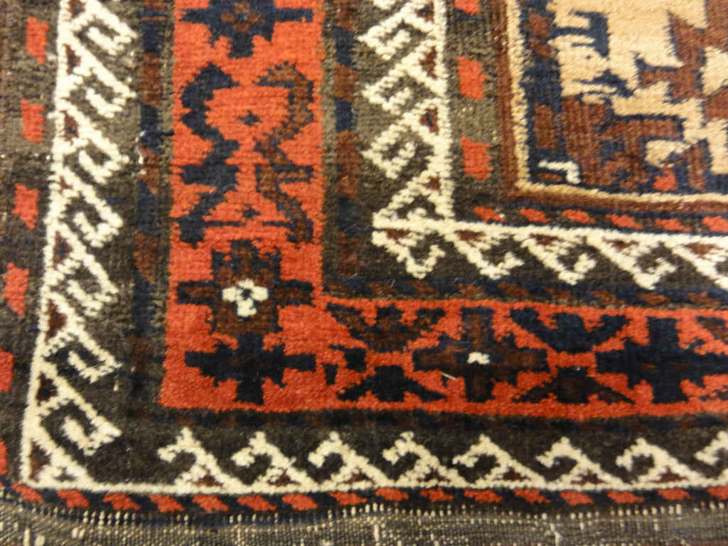 Antique Camelhair Persian Beluch Circa 1900s. A piece of genuine and authentic woven carpet art from Santa Barbara Design Center Rugs and More.