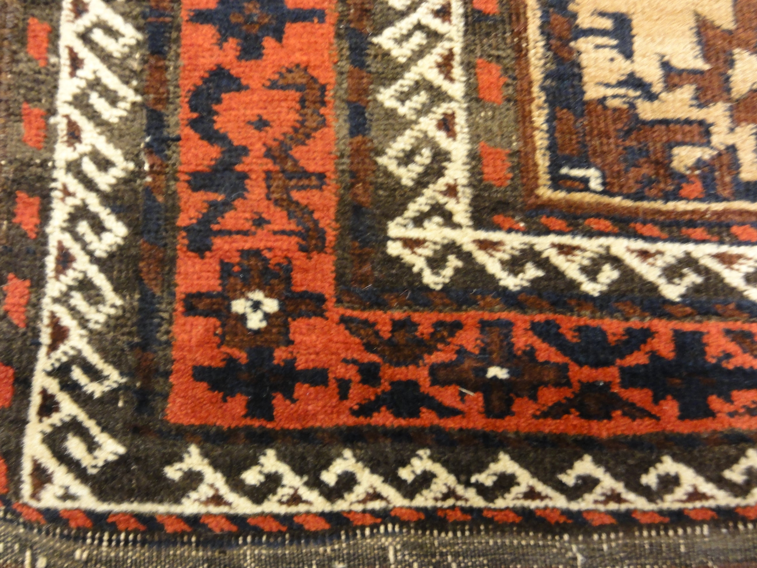 Antique Camelhair Persian Beluch Circa 1900s. A piece of genuine and authentic woven carpet art from Santa Barbara Design Center Rugs and More.