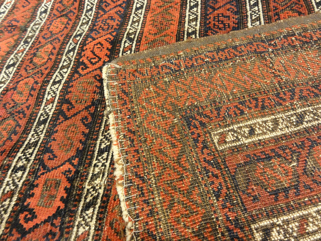 Antique Original Afghan Beluch circa 1880. A piece of genuine woven carpet art sold at the Santa Barbara Design Center Rugs and More in Santa Barbara, CA.