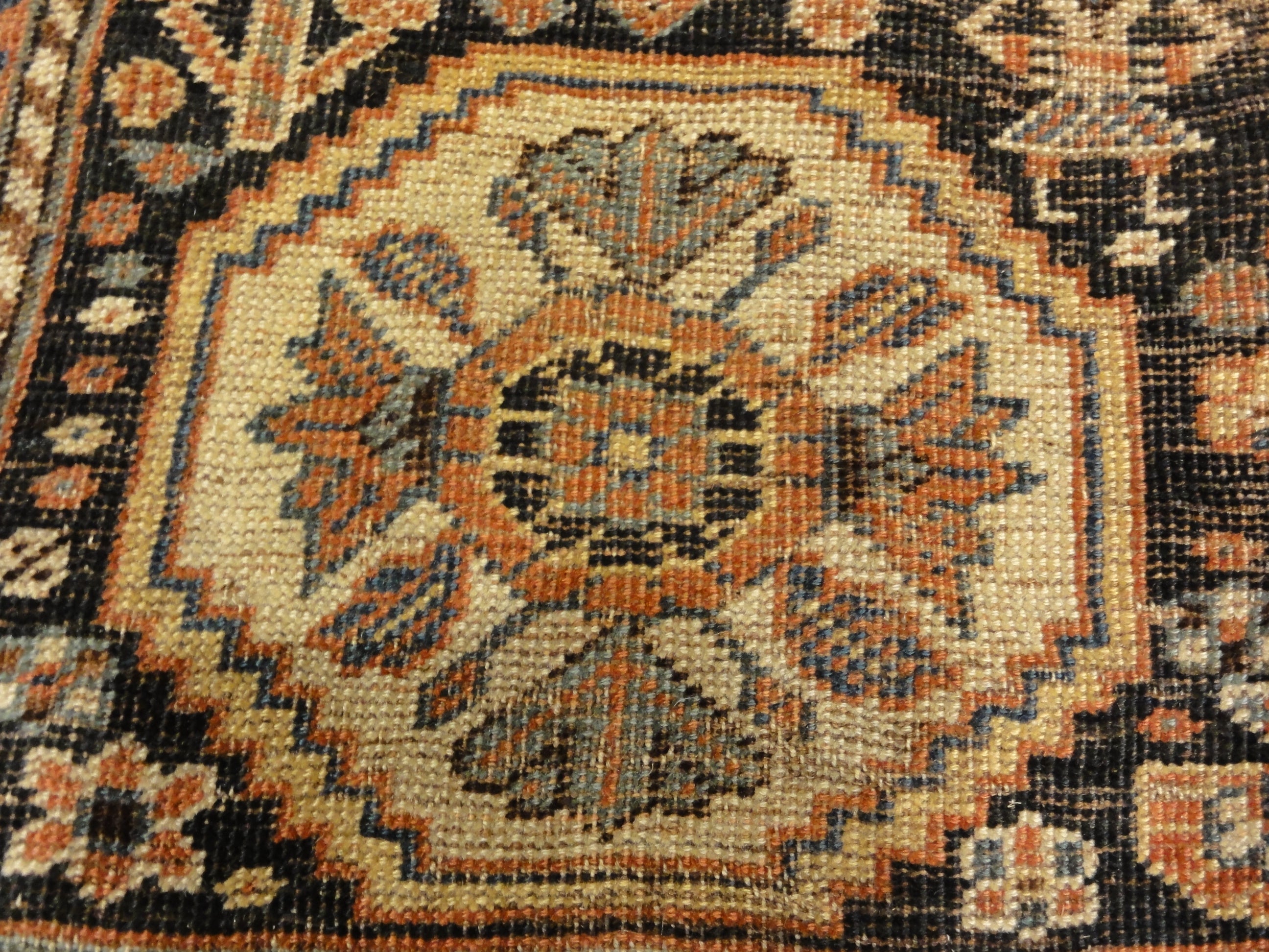 Antique Persian Qashqai featuring Tribal Flowers. A piece of genuine handwoven carpet art sold by Santa Barbara Design Center Rugs and More.