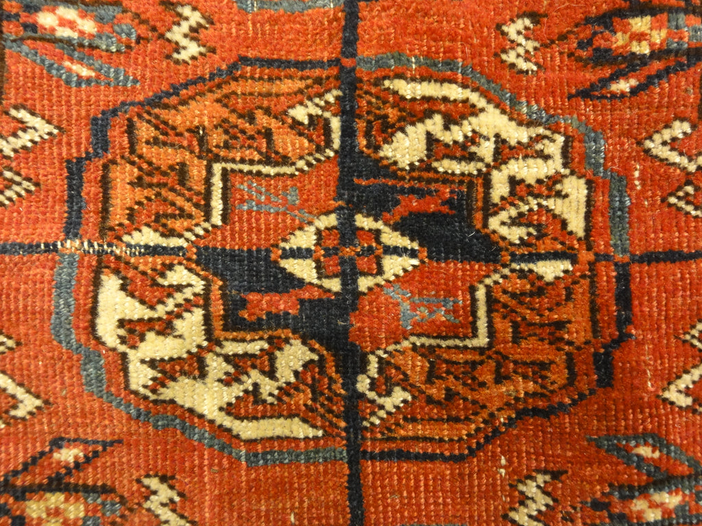 Fine Antique Tekke Bukhara Rug. A piece of genuine authentic woven carpet art sold by the Santa Barbara Design Center Rugs and More.