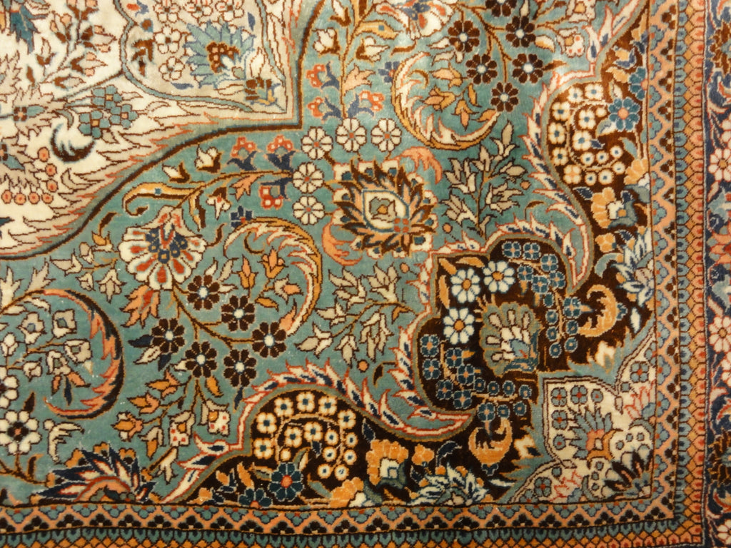An antique finest silk rug featuring the garden of paradise with 1001 flowers. A piece of genuine woven carpet art sold at Santa Barbara Design Center.