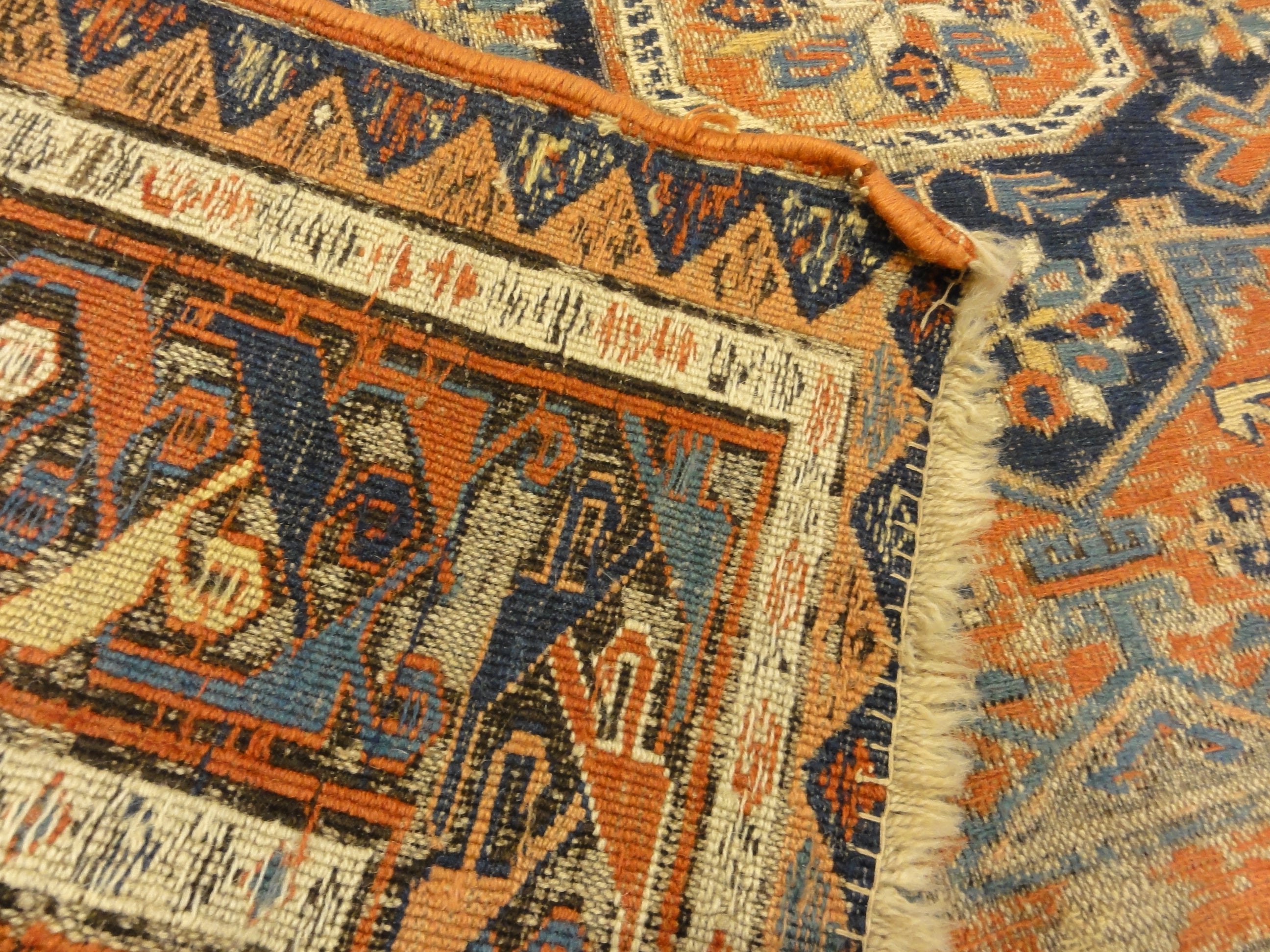 Antique Soumak Kuba Rug. A piece of genuine authentic woven carpet art sold by Santa Barbara Design Center Rugs and More.