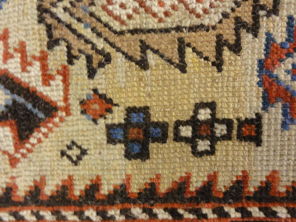 Antique Caucasian Shirvan Botteh Motif. Antique piece of woven carpet art sold by the Santa Barbara Design Center, Rugs and More in Santa Barbara, CA